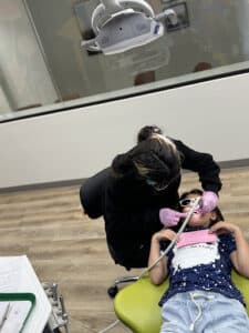child getting dental treatment